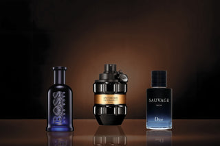 Mens fragrances on moody brown background.
