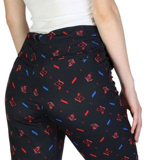 Patterned black pants.
