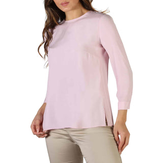 Light pink long-sleeved blouse.