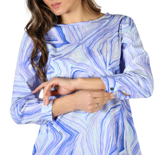 Blue and white patterned long-sleeved blouse.