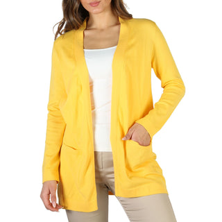 Woman’s yellow open-front cardigan.