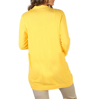 Yellow long-sleeved cardigan.