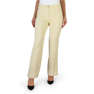 Woman’s patterned yellow dress pants.