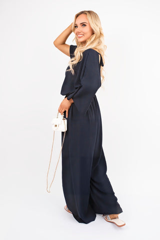 Wide Leg V Neck Jumpsuit with Back Tie Detail