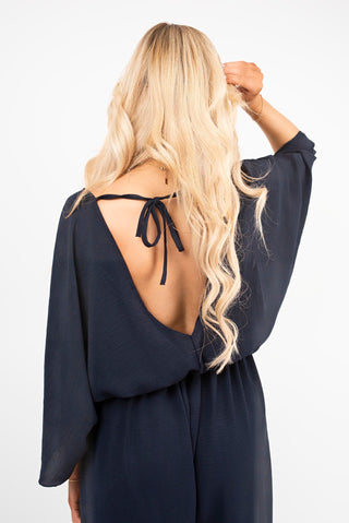Wide Leg V Neck Jumpsuit with Back Tie Detail