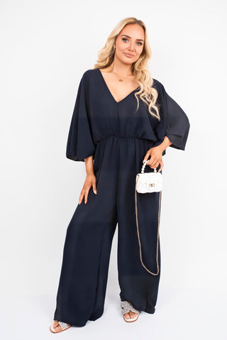 Wide Leg V Neck Jumpsuit with Back Tie Detail