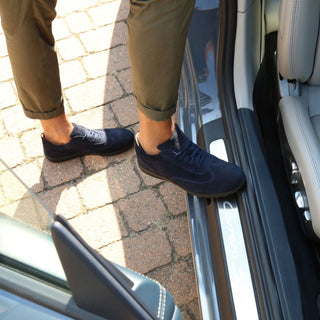 Navy suede sneakers.