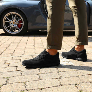Black suede sneakers.