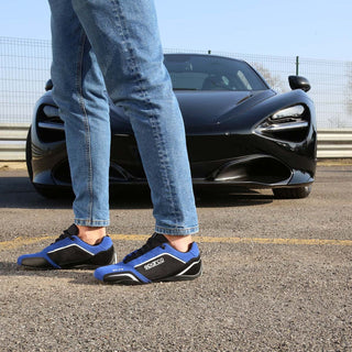 Blue and black Sparco racing shoes.